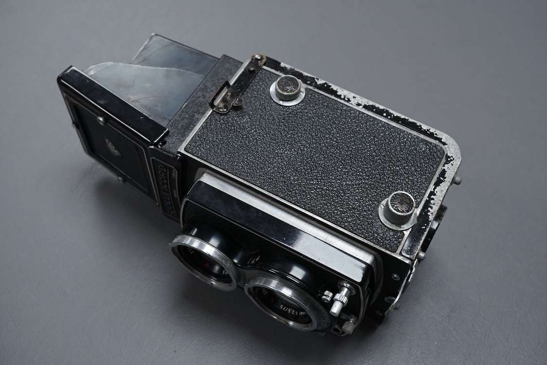 A vintage Rolleicord TLR camera, cased.
